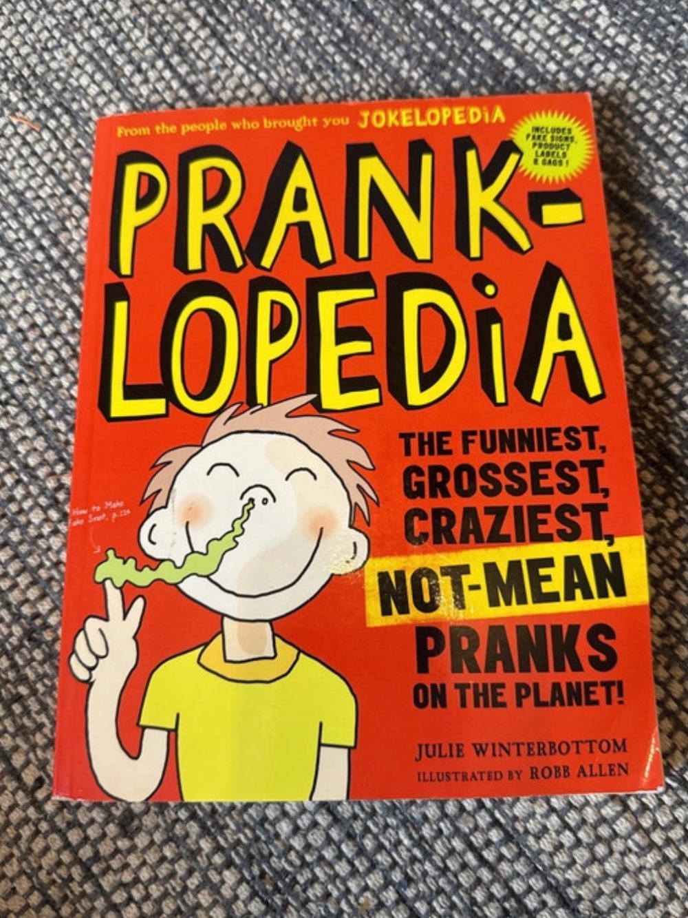 Pranklopedia Book — Bright Orange & Yellow Cover